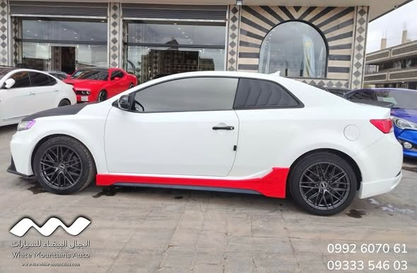 كيا فورتي 2011 - صورة 3