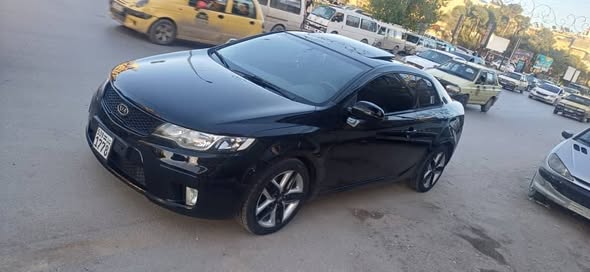 كيا فورتي 2011 - صورة 3