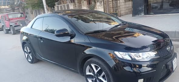 كيا فورتي 2011 - صورة 4