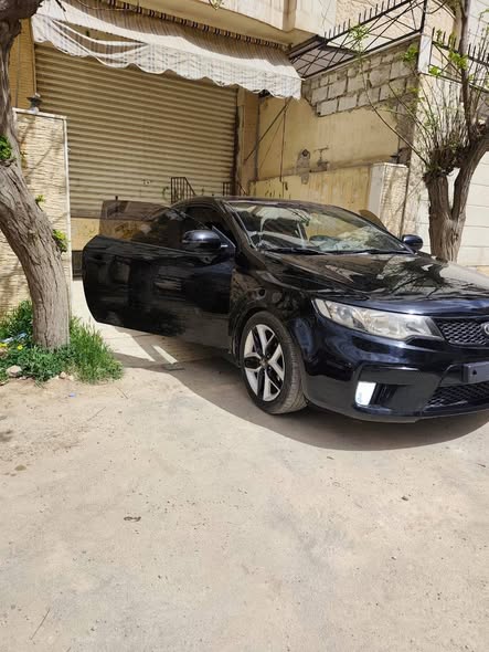 كيا فورتي 2011 - صورة 2