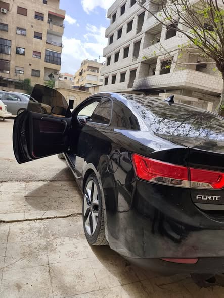 كيا فورتي 2011 - صورة 5