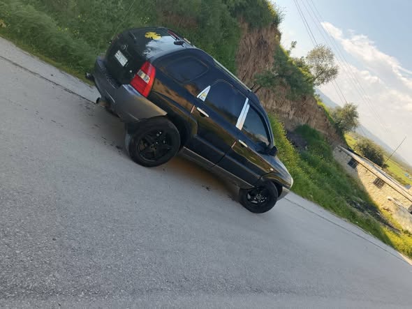 كيا سبورتاج 2005 - صورة 1