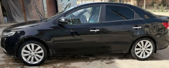 كيا فورتي 2011 - صورة 3