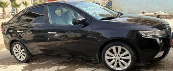 كيا فورتي 2011 - صورة 4