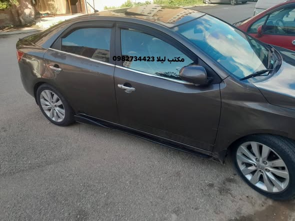 كيا فورتي 2012 - صورة 1