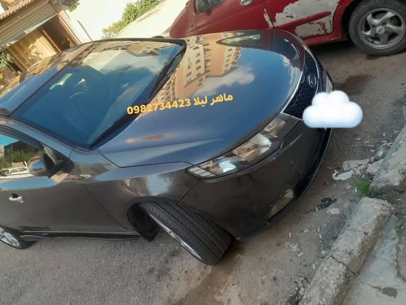 كيا فورتي 2012 - صورة 2