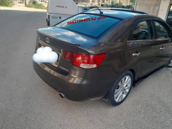 كيا فورتي 2012 - صورة 3