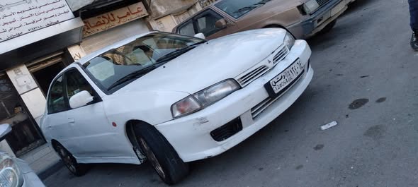 ميتسوبيشي لانسر 1998 - صورة 3