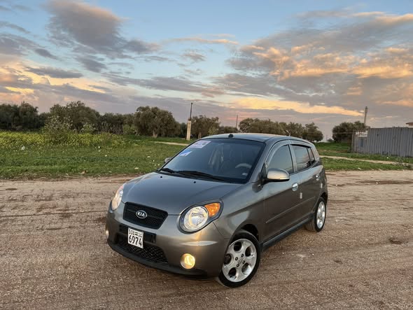 كيا مورنغ 2011 - صورة 2