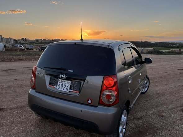 كيا مورنغ 2011 - صورة 3