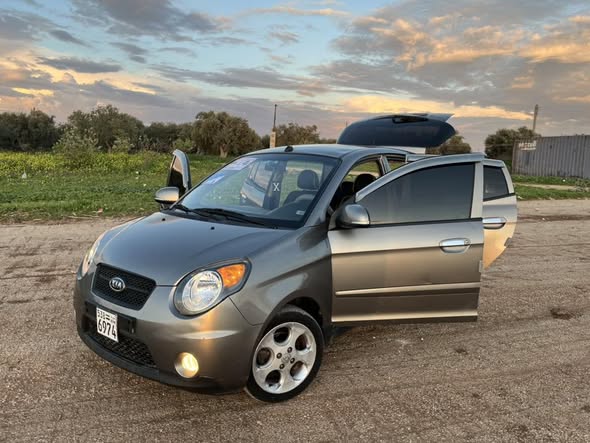 كيا مورنغ 2011 - صورة 5