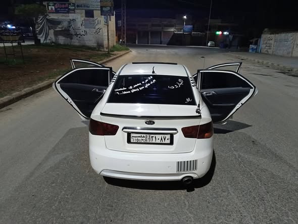 كيا فورتي 2011 - صورة 2