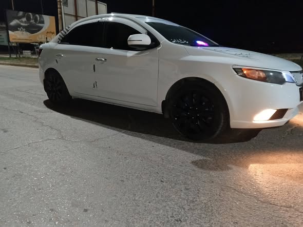 كيا فورتي 2011 - صورة 3