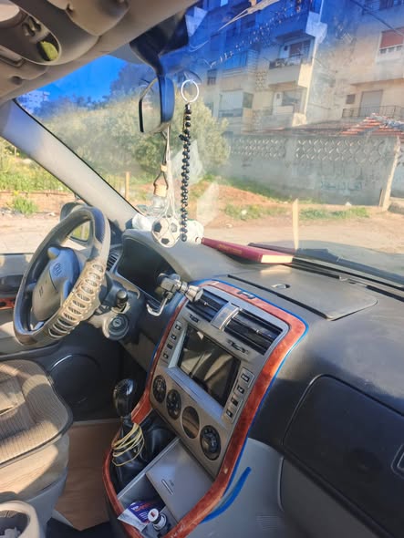 كيا كرنفال 2005 - صورة 5