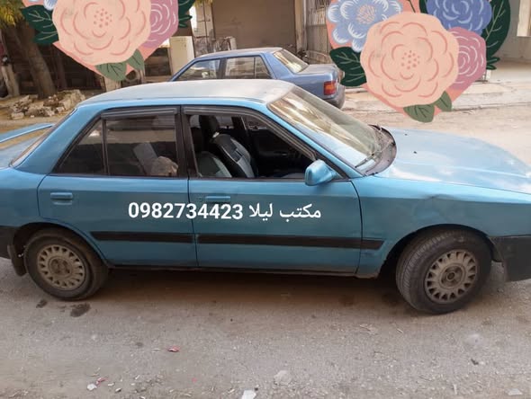 مازدا 323 1993 - صورة 2