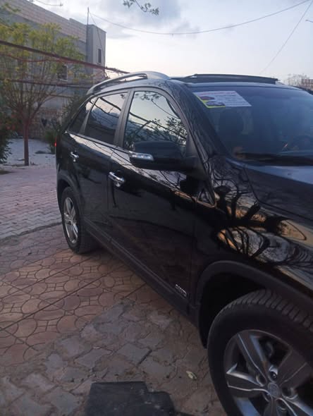 كيا سورينتو 2010 - صورة 4