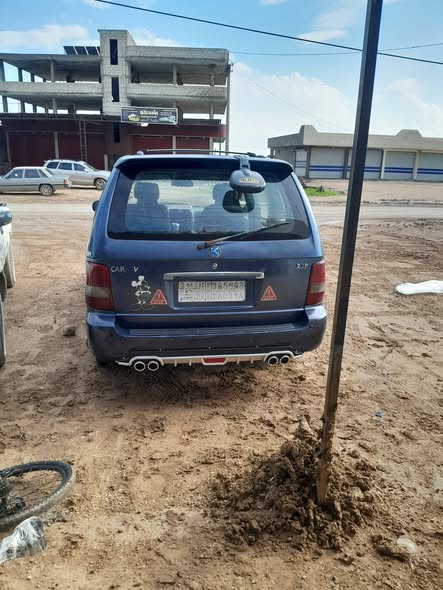 كيا كرنفال 2003 - صورة 1