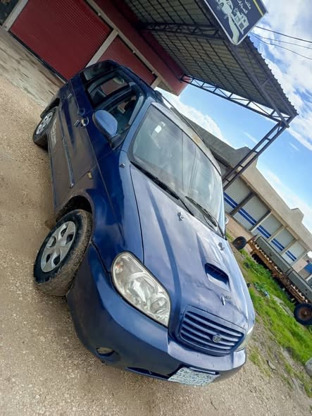 كيا كرنفال 2003 - صورة 2