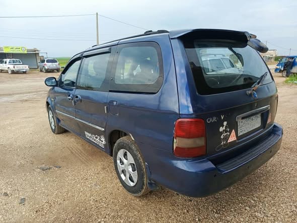 كيا كرنفال 2003 - صورة 3