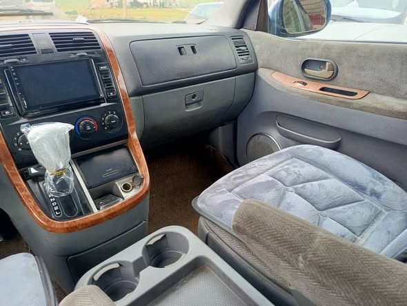 كيا كرنفال 2003 - صورة 4