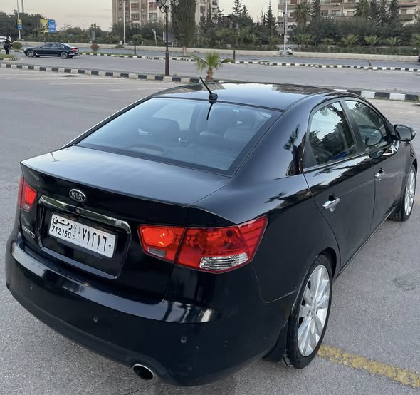 كيا فورتي 2010 - صورة 3