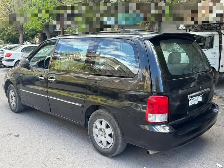 كيا كرنفال 2002