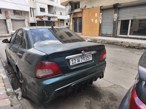 بروتون واجا 2003 - صورة 5