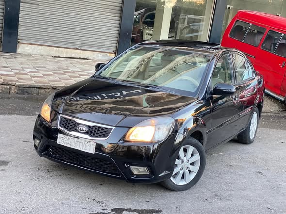 كيا ريو 2010 - صورة 1