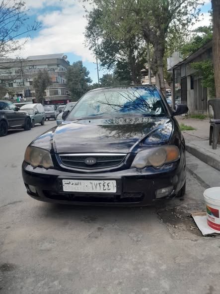 كيا شوما 2002 - صورة 2