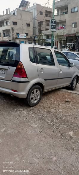 دايهاتسو سيريون 2005 - صورة 3