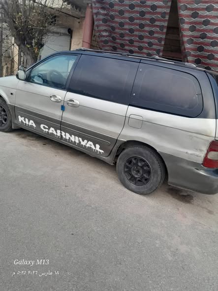 كيا كرنفال 2001 - صورة 4