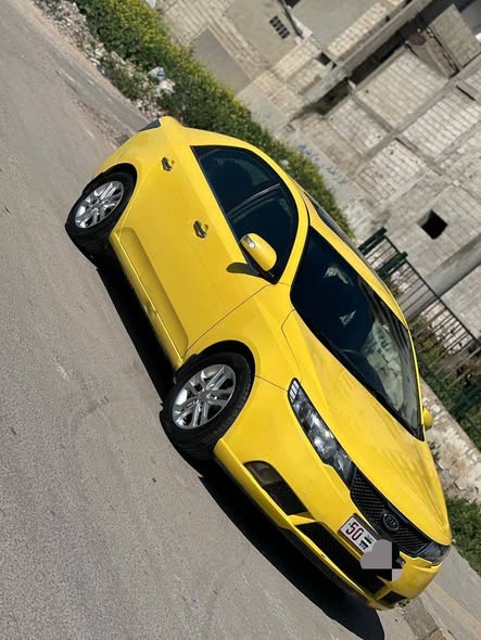 كيا فورتي 2011 - صورة 3