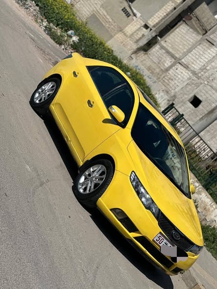 كيا فورتي 2011 - صورة 5