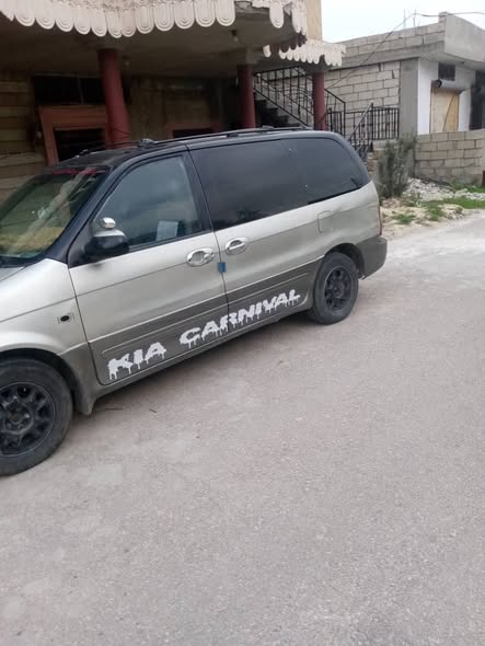 كيا كرنفال 2001 - صورة 5