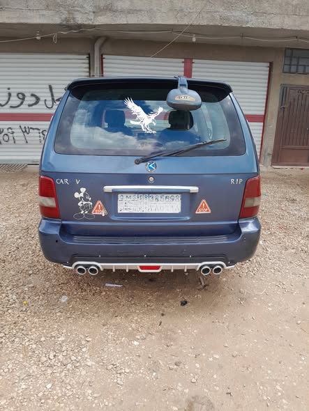 كيا كرنفال 2003 - صورة 1