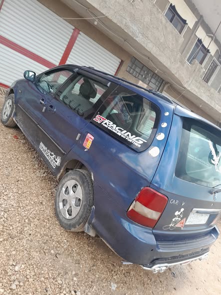 كيا كرنفال 2003 - صورة 2