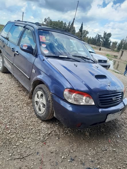 كيا كرنفال 2003 - صورة 4