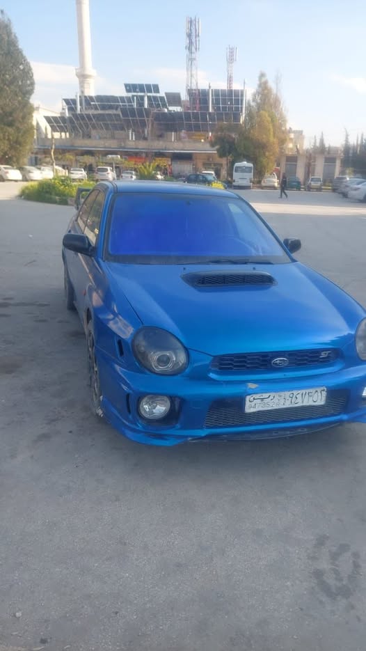 سوبارو امبريزا 2002