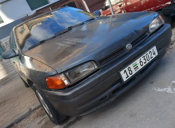 مازدا 323 1993 - صورة 4