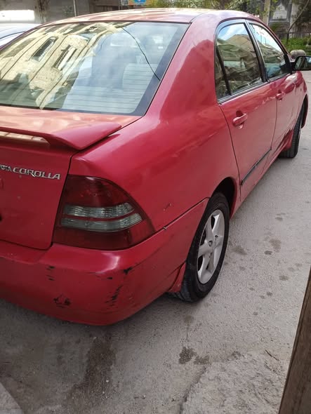 تويوتا كورولا 2004 - صورة 2