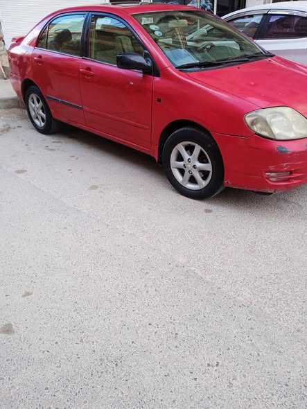 تويوتا كورولا 2004 - صورة 3