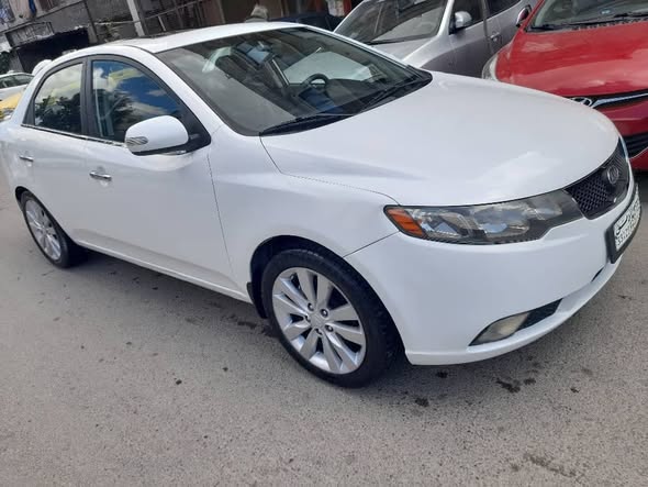 كيا سيراتو 2011 - صورة 3