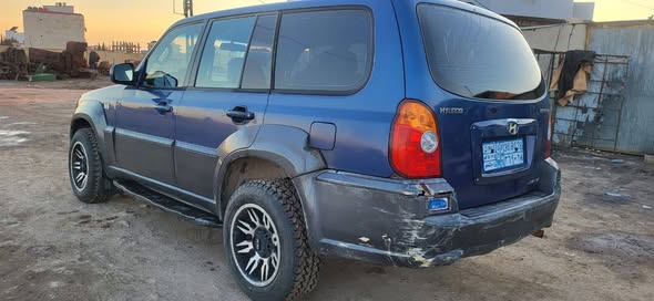 هيونداي تراكان 2004 - صورة 2