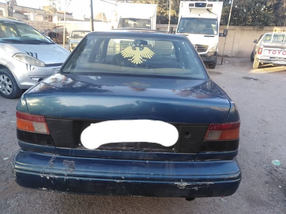 مازدا 323 1993 - صورة 1