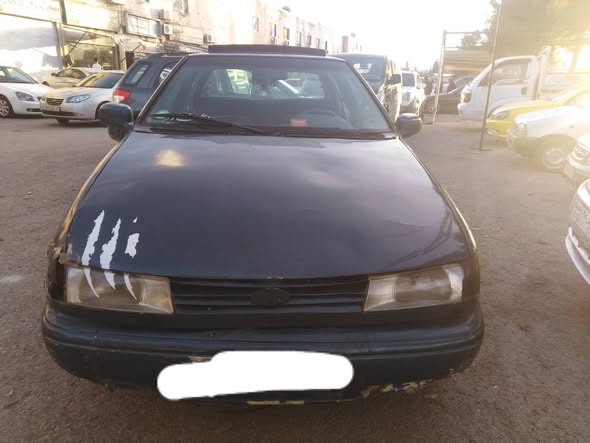 مازدا 323 1993 - صورة 2