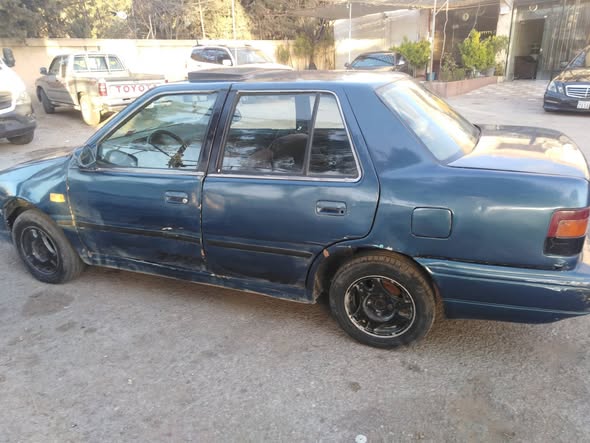 مازدا 323 1993 - صورة 5