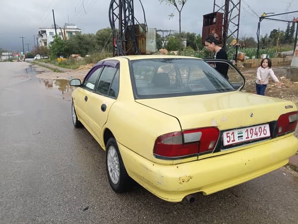 بروتون ويرا 2004 - صورة 2