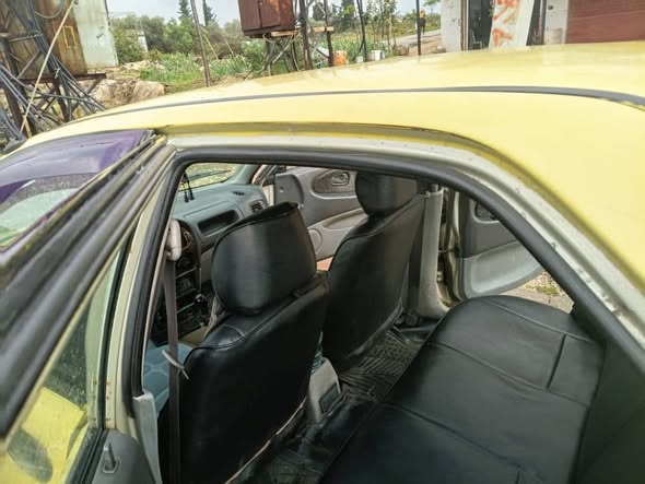 بروتون ويرا 2004 - صورة 3