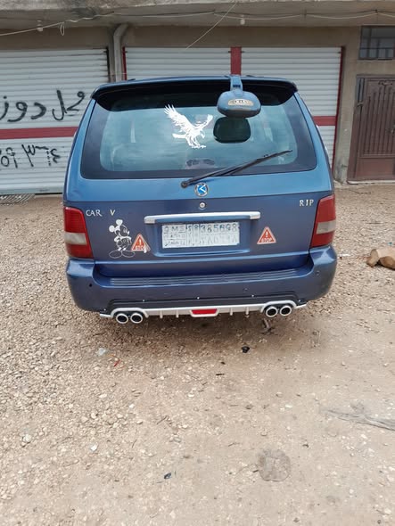 كيا كارنفال 2003 - صورة 3