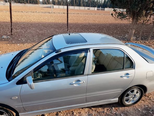 ميتسوبيشي لانسر 2006 - صورة 5